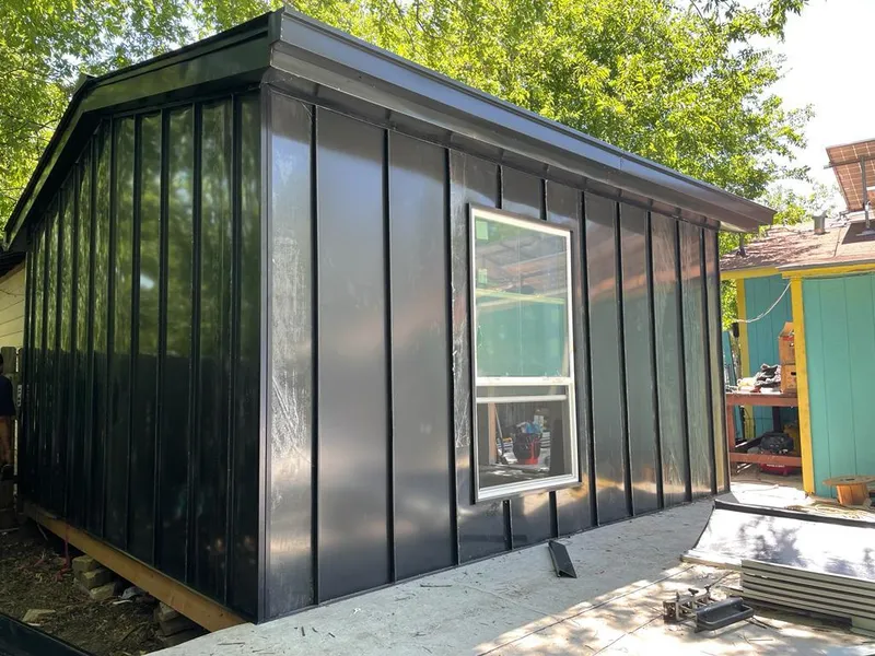 Black standing seam metal wall panels for Metal Roof Installation in Kearney